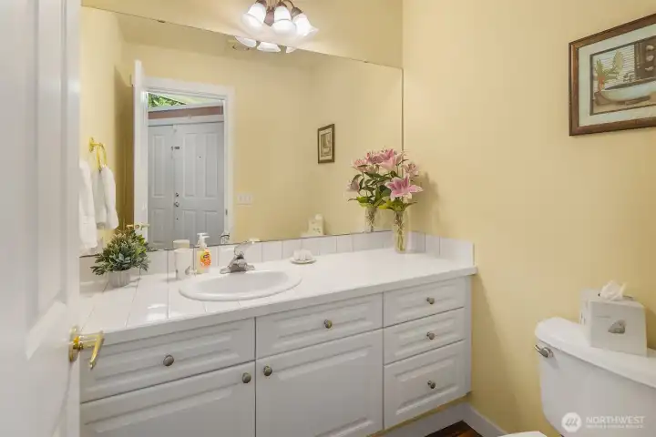 Main level powder room off the front entry way Main level powder room off the front entry way