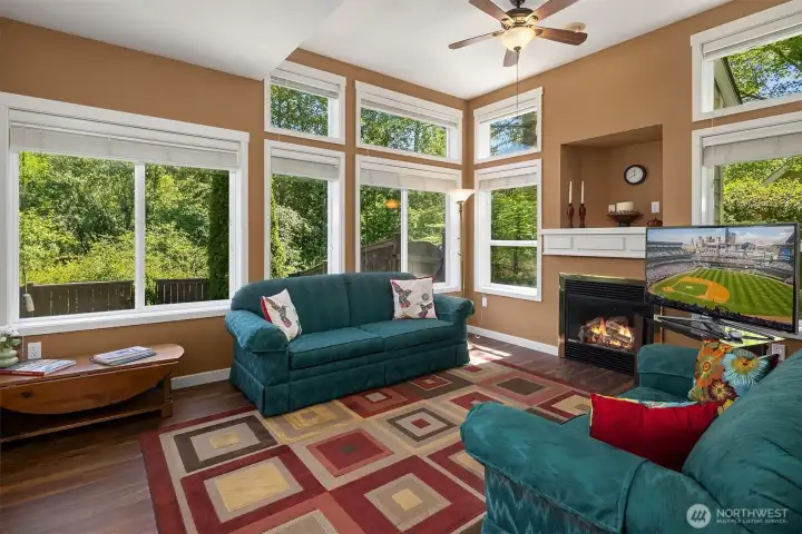 This spacious living room looks out into the private backyard and greenbelt - nice privacy. Very peaceful and quiet location. This end unit is has fantastic natural lighting! This spacious living room looks out into the private backyard and greenbelt - nice privacy. Very peaceful and quiet location. This end unit is has fantastic natural lighting!