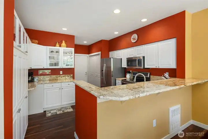 This kitchen has been nicely updated with white cabinets, granite counters, and stainless steel appliances. Notice the tall breakfast baar area too! Nice Pantry closet in the back side of the kitchen. This kitchen has been nicely updated with white cabinets, granite counters, and stainless steel appliances. Notice the tall breakfast baar area too! Nice Pantry closet in the back side of the kitchen.