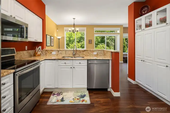 Lots of storage space in this kitchen. Luxury Vinyl Plank Flooring. Granite Counter Tops! Stainless Steel Appliances. A wonderful and functional kitchen for those Chef's out there! Lots of storage space in this kitchen. Luxury Vinyl Plank Flooring. Granite Counter Tops! Stainless Steel Appliances. A wonderful and functional kitchen for those Chef's out there!