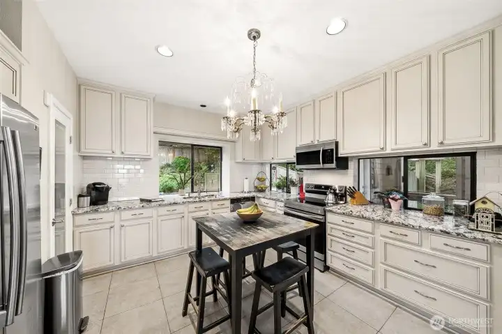 Eat-in kitchen with walk-in pantry. Eat-in kitchen with walk-in pantry.
