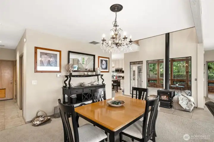 Dining room. Door down the hallway leads outside. Dining room. Door down the hallway leads outside.