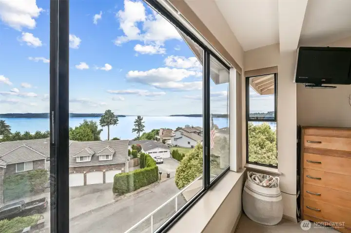 Primary bedroom windows with amazing views. Primary bedroom windows with amazing views.