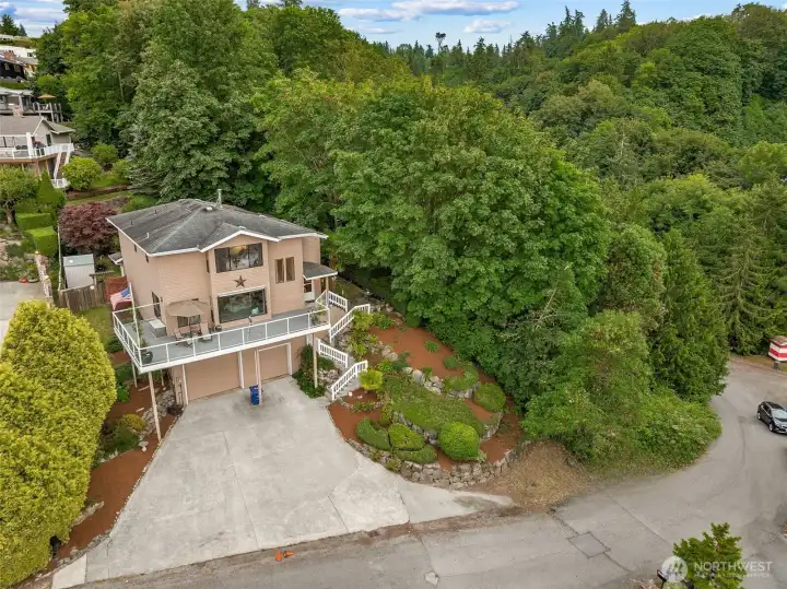 Extra large driveway for extra parking. Trees allow for extra privacy. Extra large driveway for extra parking. Trees allow for extra privacy.