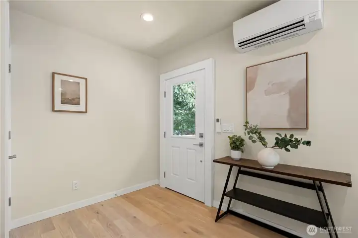 Mini-splits in the living area and upper bedrooms keep the home comfortable year-round.