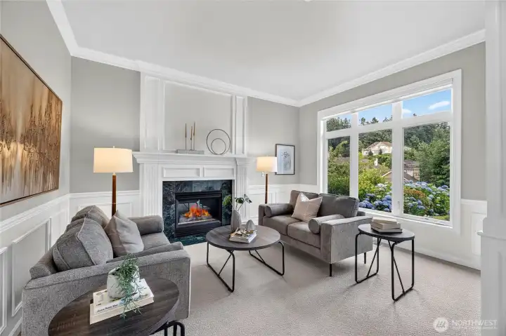 Formal living room with a gas fireplace for quiet getaway conversations. Formal living room with a gas fireplace for quiet getaway conversations.