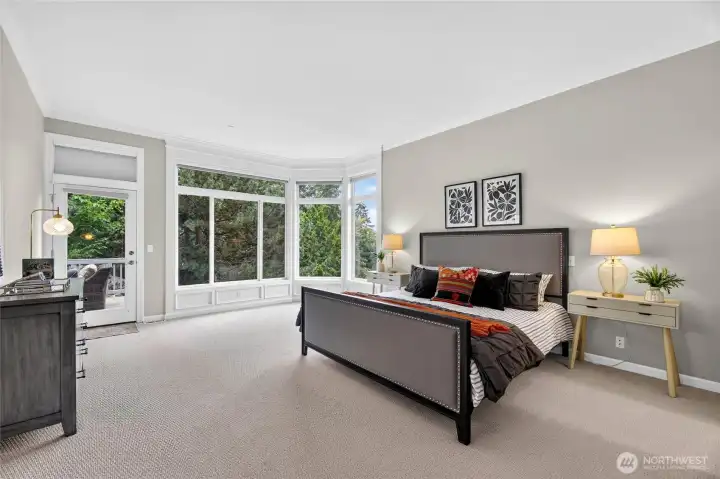 A very spacious Primary Bedroom retreat with a view! Access to the deck through the side door. A very spacious Primary Bedroom retreat with a view! Access to the deck through the side door.