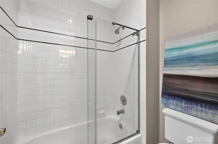 Shared Bath tub/shower. Shared Bath tub/shower.