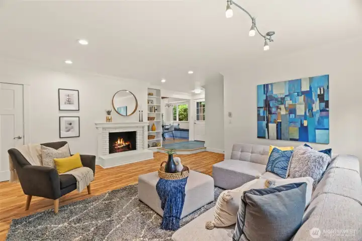 Family room with fireplace and built-in bookshelf.
