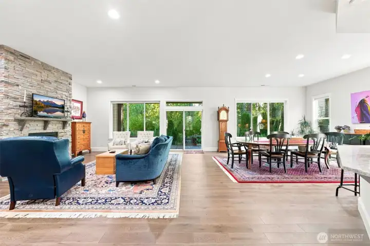 Full of windows, including an extra transom window above the slider, the back of the home looks out to the designated greenbelt for nature views and privacy.