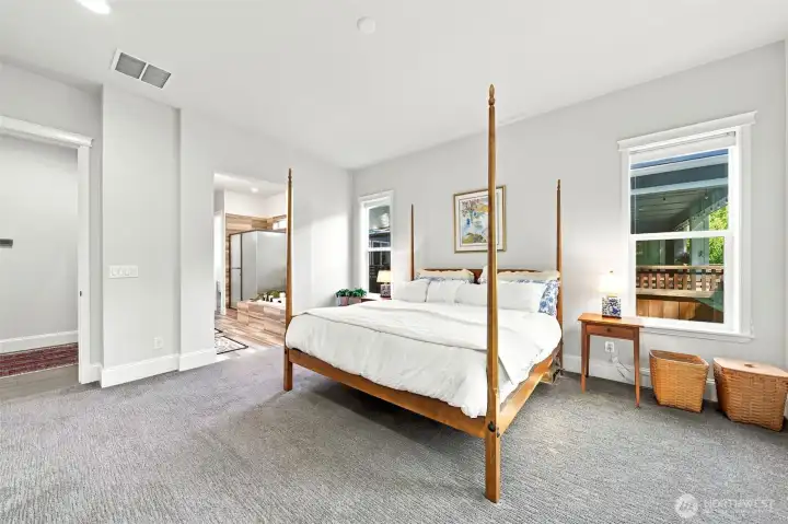 The primary bedroom has an ensuite bathroom and walk-in closet.
