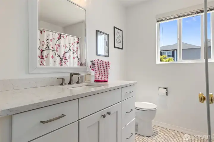 Full bath, upstairs, tile floor, tile surround in the tub
