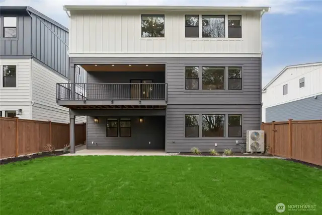 3 levels of luxury living! Lower level opens out to fully landscaped and fenced yard with sprinklers!