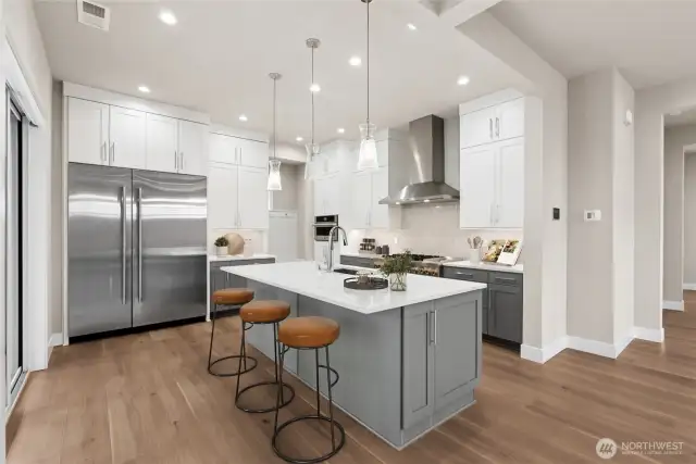 Actual kitchen of Darlington plan lot 3 - Virtual staging.  All appliances included! Sleek and modern entertaining space!