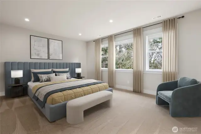 Primary suite has large windows to let in ample light!