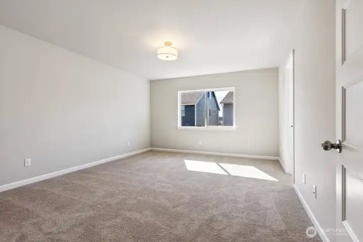 **Photos of simlar floorplan in another community. Features and specs will vary**