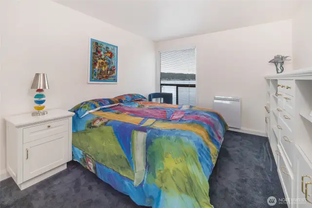 Primary bedroom with views of the bay.