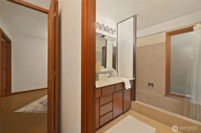 Bathroom showcases a clean, contemporary feel.
