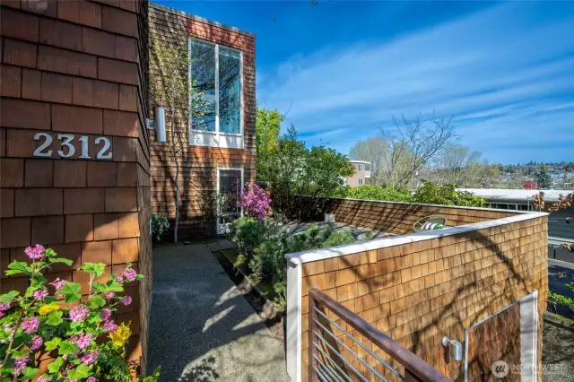 This condo is part of 2-unit HOA so it has the rare individual outdoor spaces and individual garage.