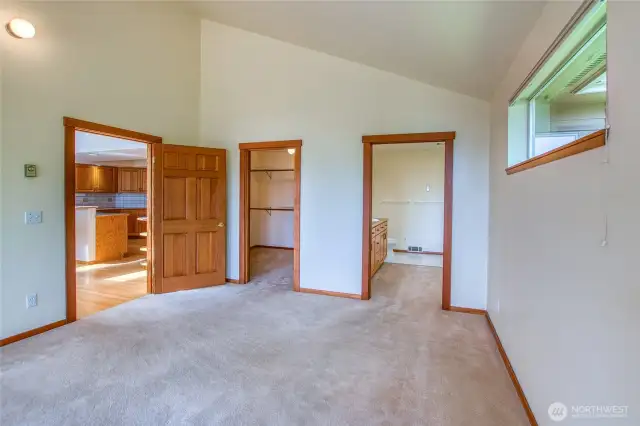 Primary bedroom with closet and bath.