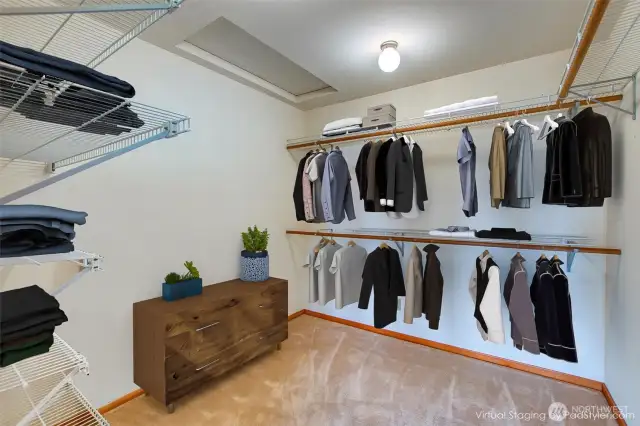 Primary walk-in closet virtual staging.