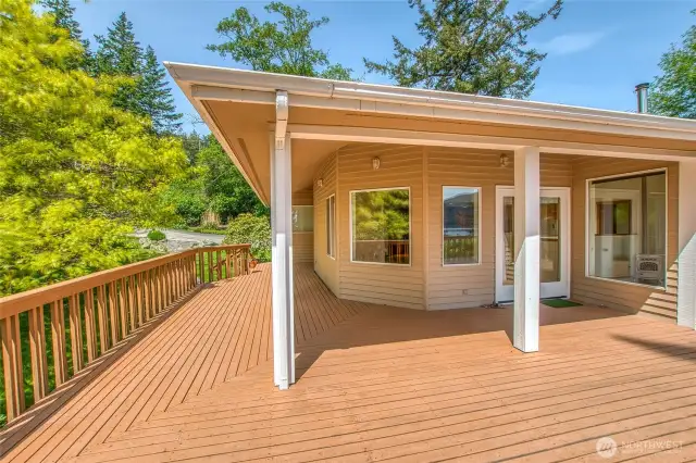 The deck wraps around the west and south side of the home.