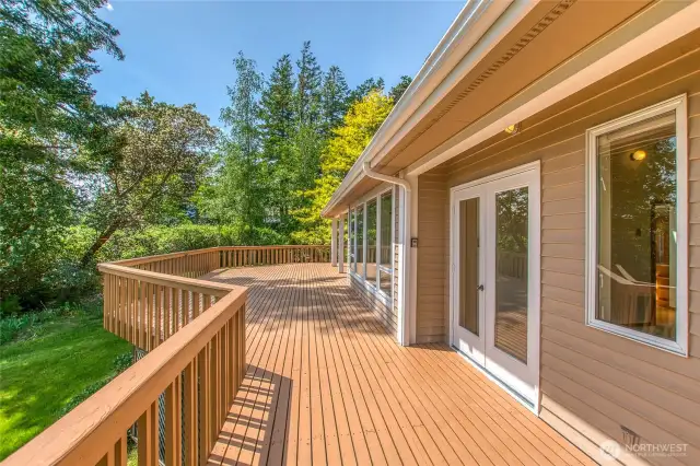 Large deck wraps around to the primary bedroom.