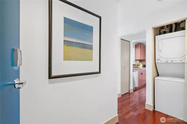 A warm welcome starts here, with hardwood floors leading into the heart of the home. In-unit washer and dryer for the ultimate everyday convenience.