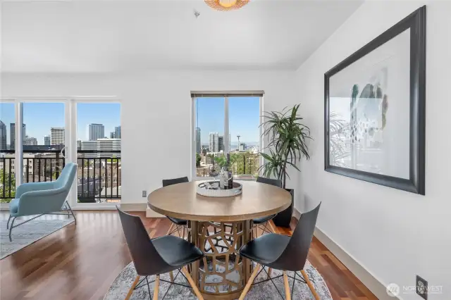 A defined dining space perfectly placed for city-view dinners and casual brunches.