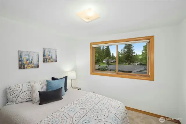 Second upstairs bedroom with golf course view.