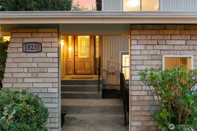 Spacious covered entry with skylight.