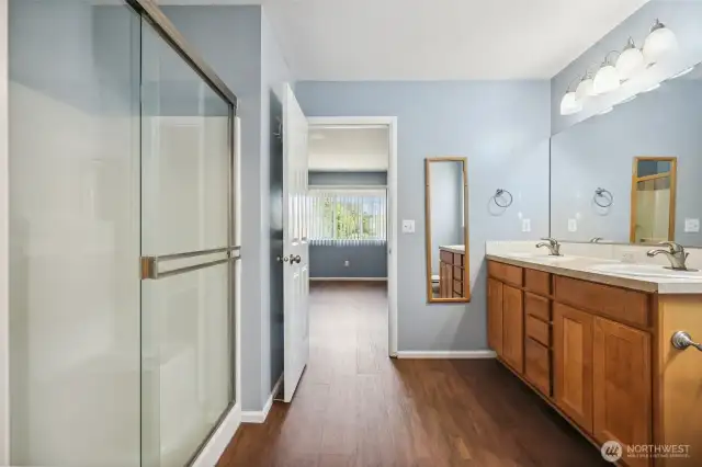 Looking from primary closet and back towards the bedroom