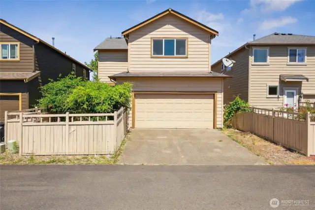 Paved alley access 2 car garage entrance. Theres a community park just around the corner.