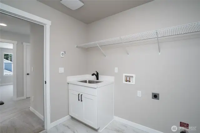 Photos are of another home in the community and are for illustration purposes only to reflect typical finishes.  May depict seller enhancements.  Colors and options may vary.