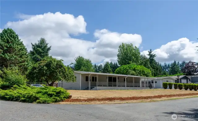This well-maintained home is situated nicely on a large corner lot.