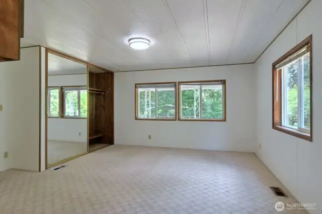 Good size sliding mirrored closet for your personal storage needs.