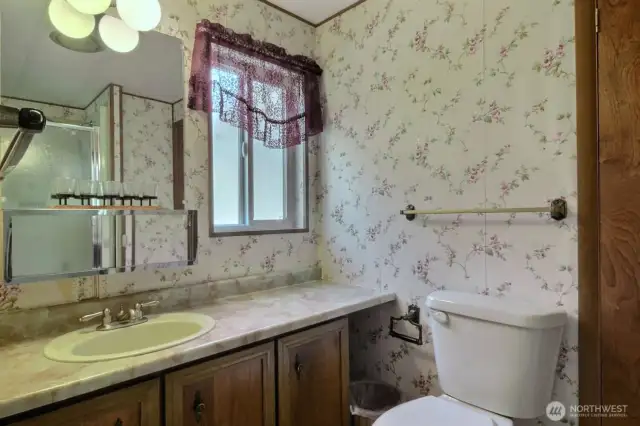 A lovely full main bath services second bedroom as well as your guests.