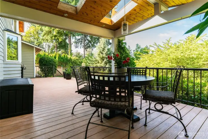The outdoor living space accessed from dining room, with vaulted cedar ceilings and skylights, perfect for gatherings