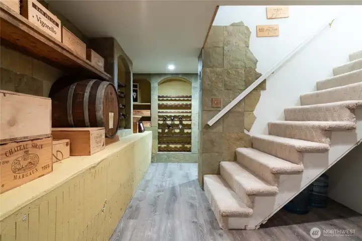 A wine cellar to boast about with built in wine racks, and cozy space for tasting