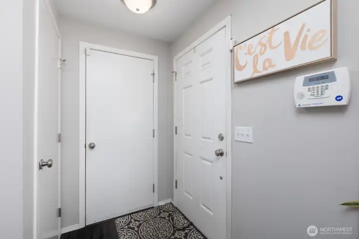 Entrance to garage and storage closet.