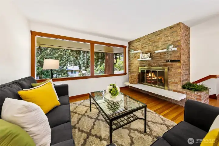 Picture windows and cozy fireplace