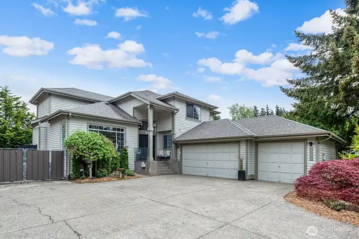 Front access to backyard has a wide gate and driveway is extended to the back of the property for boat or rv storage.