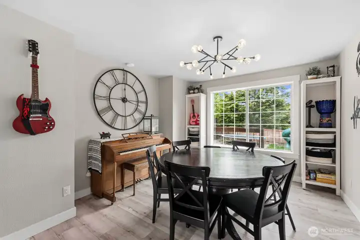 Over sized window in dining room looking to the backyard.