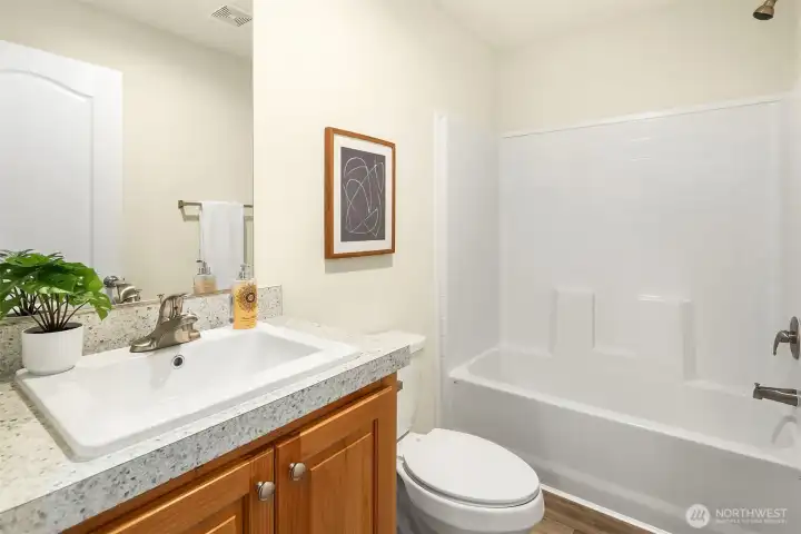 Additional bathroom designed for functionality and convenience