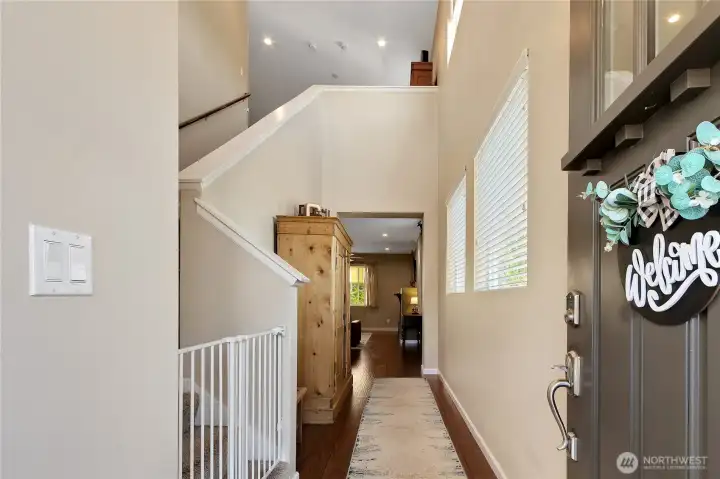 An inviting entry greets you with tall vaulted ceilings.