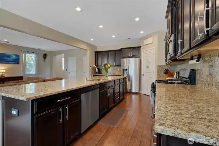 This kitchen offers generous counter space, stainless steel appliances, and a layout that flows really well.