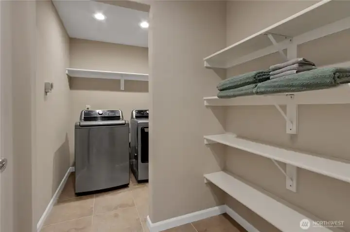 Laundry area located upstairs for added convenience.
