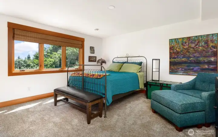 Downstairs large bedroom has lots of space and easy access to the backyard. Downstairs large bedroom has lots of space and easy access to the backyard.