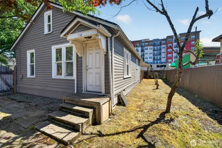 Front Door Facing Lincoln Ave N and Side Yard