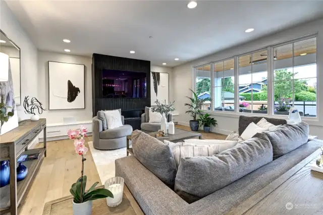 Expansive great room and specialty tiled fireplace.